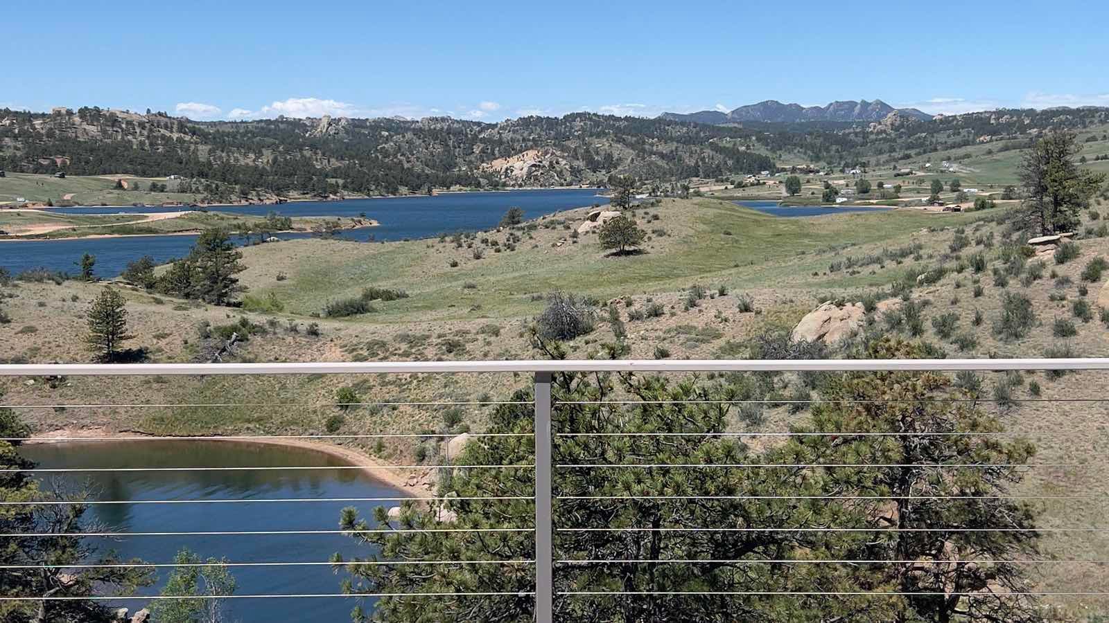 Granite Reservoir and the hills of Curt Gowdy State Park seen from the cable-rail deck