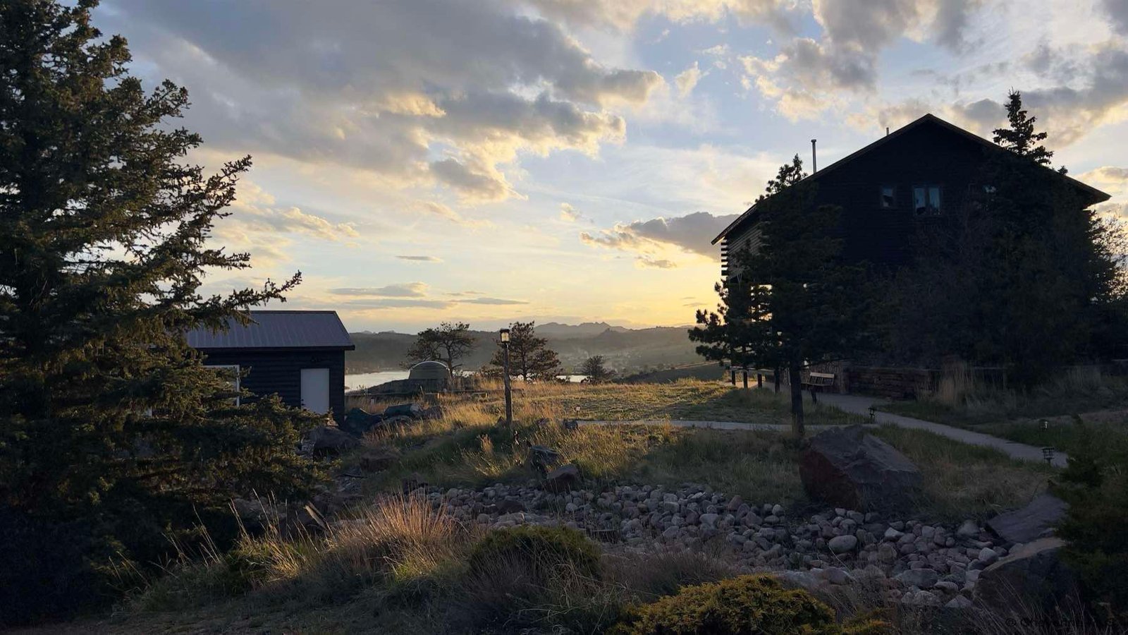 Sunset over the main lodge and the reservoir